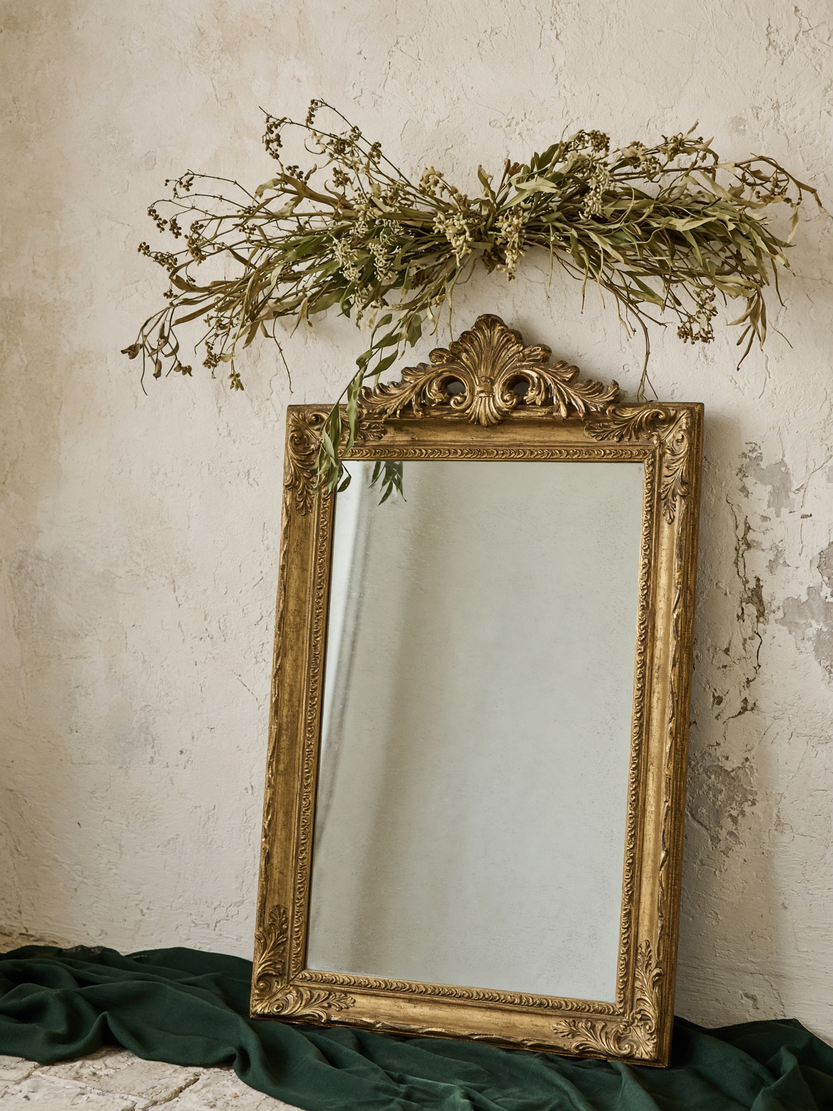 Gilt leaning mirror
